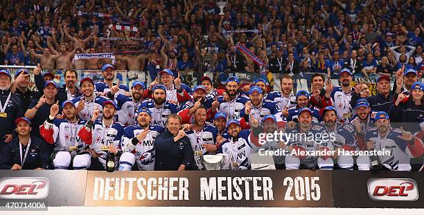 The team of Mannheim celebrates winning the German Championship title after winning the DEL Play-offs Final Game 6 between ERC Ingolstadt and Adler...