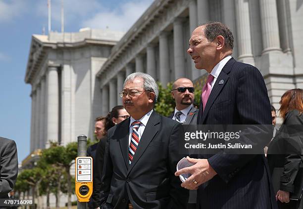 Veterans Affairs secretary Robert McDonald walks with San Francisco mayor Ed Lee following a meeting with San Francisco Bay Area mayors on April 22,...