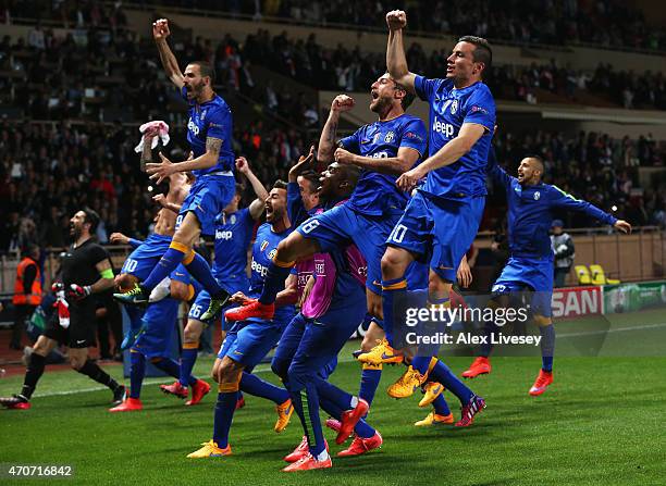 Juventus players celebrate after the UEFA Champions League quarter-final second leg match between AS Monaco FC and Juventus at Stade Louis II on...