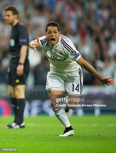 Javier Hernandez of Real Madrid CF celebrates as he scores their first goal during the UEFA Champions League quarter-final second leg match between...