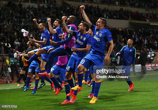 Juventus players celebrate after the UEFA Champions League quarter-final second leg match between AS Monaco FC and Juventus at Stade Louis II on...