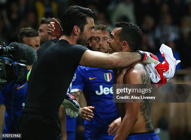 Gianluigi Buffon of Juventus celebrates with Carlos Tevez of Juventus after the UEFA Champions League quarter-final second leg match between AS...