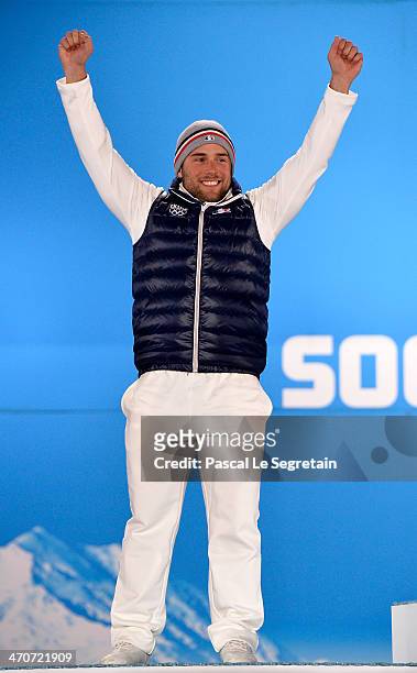 Silver medalist Arnaud Bovolenta of France celebrates during the medal ceremony for the Freestyle Skiing Men's Ski Cross on day thirteen of the Sochi...