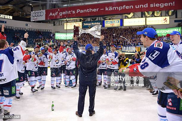 Coach Geoff Ward of Adler Mannheim celebrate after the game between ERC Ingolstadt and Adler Mannheim on April 22, 2015 in Mannheim, Germany.