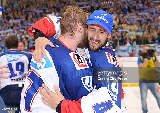 Nikolai Goc and Dennis Endras of Adler Mannheim celebrate after the game between ERC Ingolstadt and Adler Mannheim on April 22, 2015 in Mannheim,...