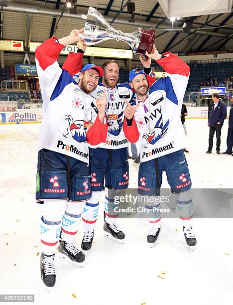 Matthias Plachta, Dennis Endras and Marcus Kink of Adler Mannheim celebrate after the game between ERC Ingolstadt and Adler Mannheim on April 22,...