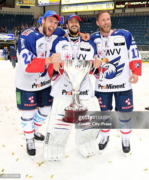 Matthias Plachta, Dennis Endras and Marcus Kink of Adler Mannheim celebrate after the game between ERC Ingolstadt and Adler Mannheim on April 22,...