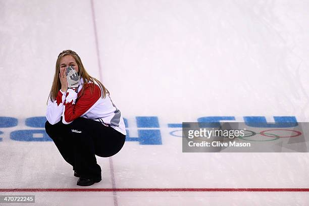 Jennifer Jones of Canada celebrates after placing a stone to win the gold medal during the Gold medal match between Sweden and Canada on day 13 of...