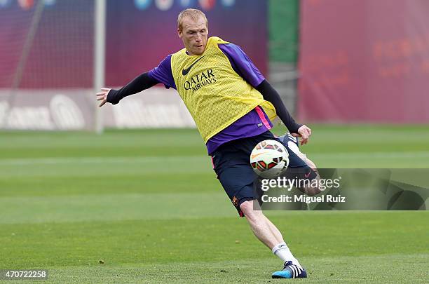 Jeremy Mathieu shoots during the FC Barcelona training session at Ciutat Esportiva on April 22, 2015 in Barcelona, Spain.