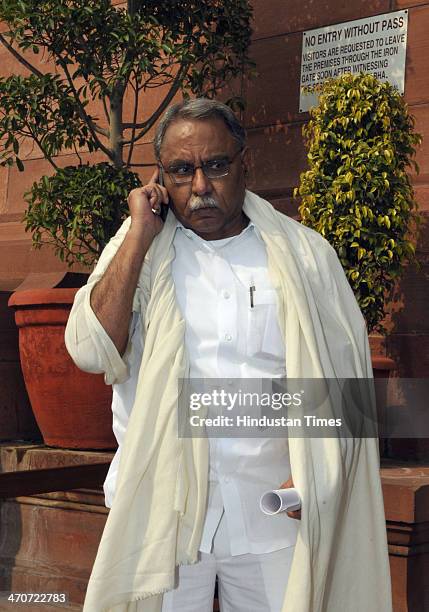 Rajya Sabha MP from Andhra Pradesh KVP Ramachandra Rao arrives to attend extended winter session of Parliament on February 20, 2014 in New Delhi,...