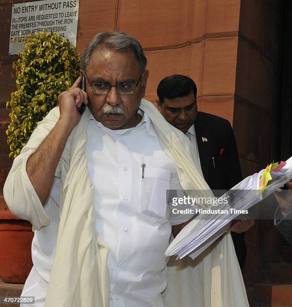 Rajya Sabha MP from Andhra Pradesh KVP Ramachandra Rao arrives to attend extended winter session of Parliament on February 20, 2014 in New Delhi,...