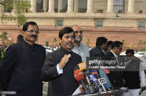 Shahnawaz Hussain talking with the media after attending the extended winter session of Parliament on February 20, 2014 in New Delhi, India....