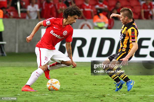 Valdivia of Internacional battles for the ball against Chumacero of The Strongest during match between Internacional and The Strongest as part of...