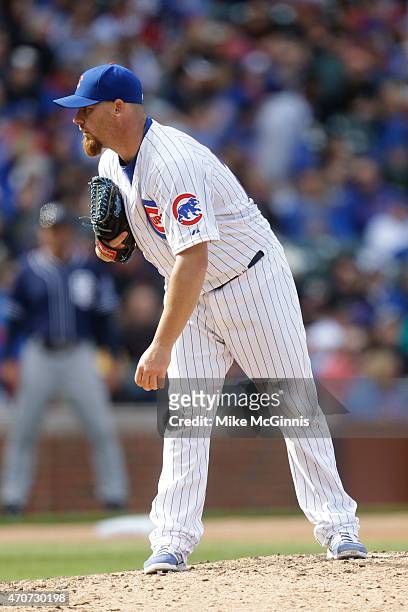 Phil Coke of the Chicago Cubs pitches during the game against the San Diego Padres at Wrigley Field on April 18, 2015 in Chicago, Illinois.