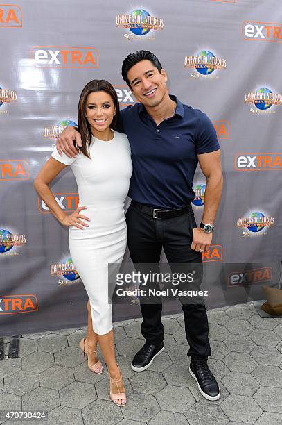 Eva Longoria and Mario Lopez visit "Extra" at Universal Studios Hollywood on April 22, 2015 in Universal City, California.