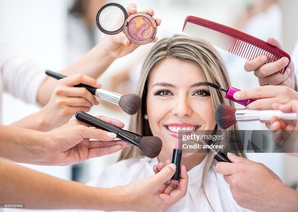 Woman getting a makeup makeover