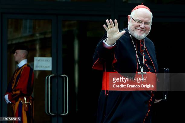 German Cardinal Reinhard Marx waves as he arrives at the Paul VI Hall for an Extraordinary Consistory on the themes of Family on February 20, 2014 in...