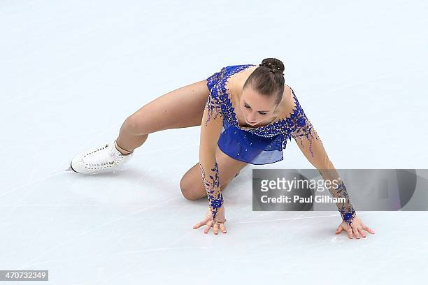 Nathalie Weinzierl of Germany falls while competing in the Figure Skating Ladies' Free Skating on day 13 of the Sochi 2014 Winter Olympics at Iceberg...