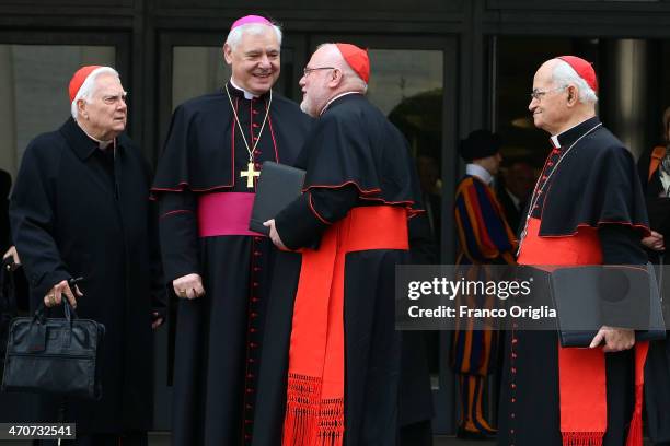 German cardinal Reinhard Marx greets German Archbishop and Cardinal designate Gerhard Ludwig Muller after an Extraordinary Consistory on the themes...