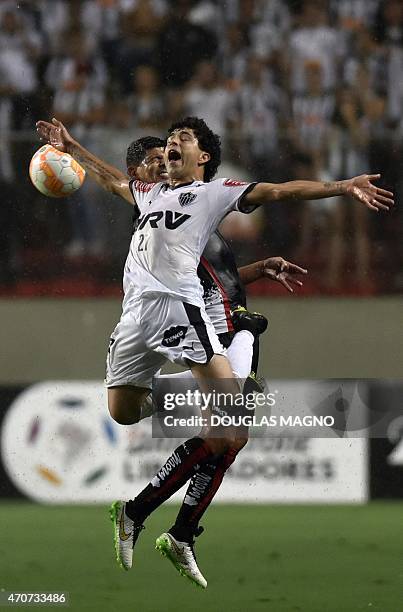 Esteban Pavez, of Chile's Colo Colo vies for the ball with Luan, of Brazil's Atletico Mineiro, during their 2015 Libertadores Cup match at the...
