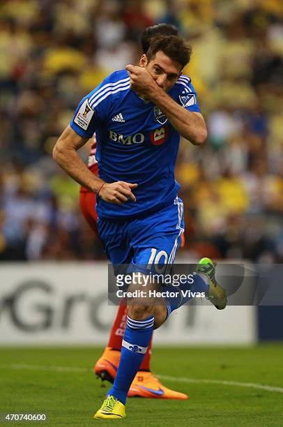 Ignacio Piatti of Montreal Impact celebrates after scoring the first goal of his team during a Championship first leg match between America and...