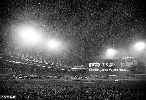 Sleet falls onto the field in the top of the seventh inning during the game between the Pittsburgh Pirates and the Chicago Cubs at PNC Park on April...