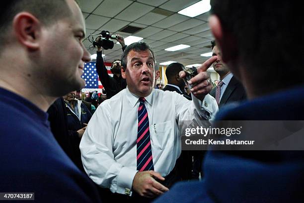 New Jersey Gov. Chris Christie speaks with residents during a Town Hall meeting with families affected by Superstorm Sandy at a Veterans of Foreign...