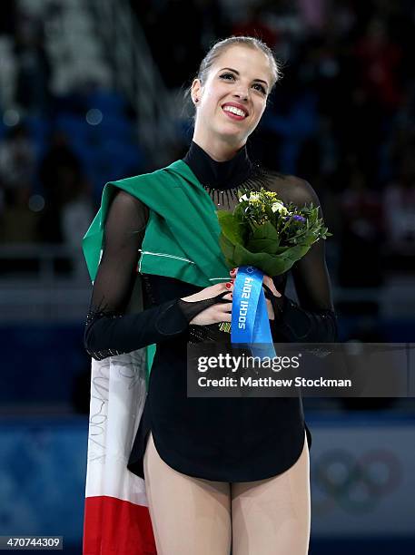 Bronze medalist Carolina Kostner of Italy celebrates during the flower ceremony for the Ladies' Figure Skating on day 13 of the Sochi 2014 Winter...