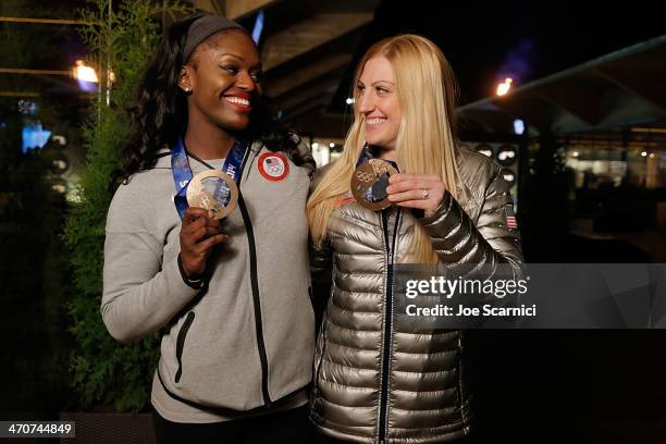 Olympians Aja Evans and Jamie Greubel visit the USA House in the Olympic Village on February 20, 2014 in Sochi, Russia.