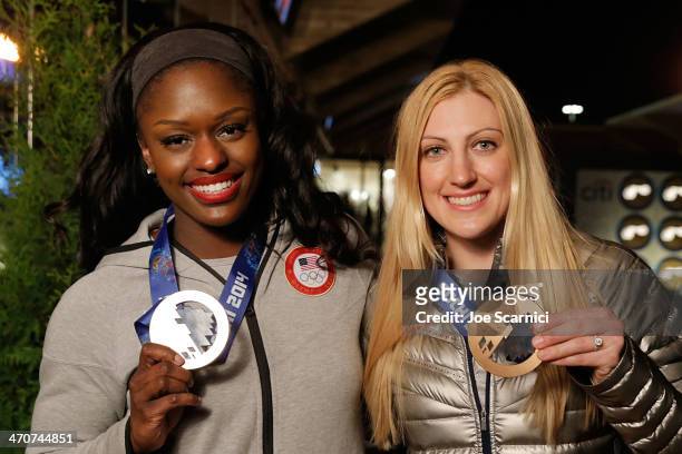 Olympians Aja Evans and Jamie Greubel visit the USA House in the Olympic Village on February 20, 2014 in Sochi, Russia.
