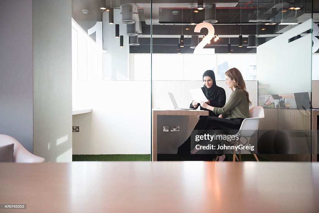 Businesswomen in Middle East office workplace