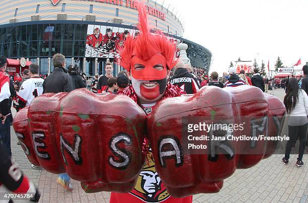 Fan enjoys the atmosphere prior to the start of a game between the Ottawa Senators and the Montreal Canadiens in Game Four of the Eastern Conference...