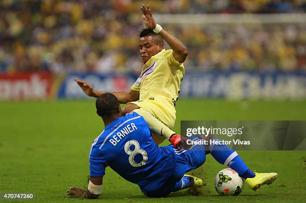 Michael Arroyo of America struggles for the ball with Patrice Bernier of Montreal Impact during a Championship first leg match between America and...
