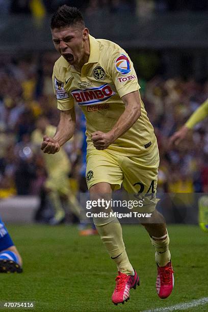 Oribe Peralta of America celebrates after scoring the first goal of his team during a Championship first leg match between America and Montreal...