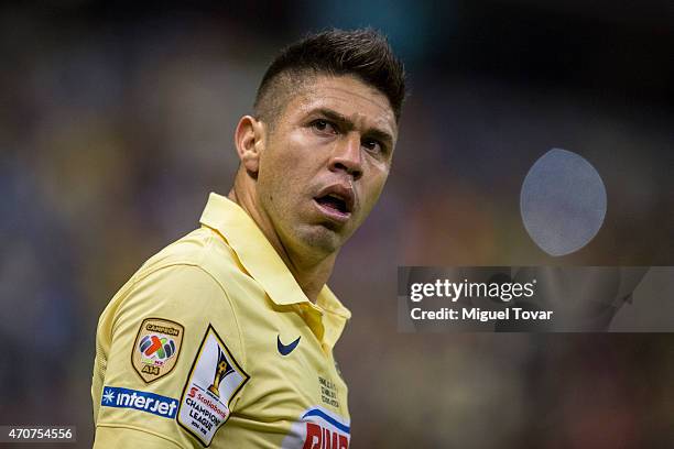 Oribe Peralta of America reacts after scoring the first goal of his team during a Championship first leg match between America and Montreal Impact as...