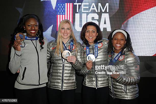 Olympians Aja Evans Jamie Greubel, Elana Meyers and Lauryn Williams visit the USA House in the Olympic Village on February 20, 2014 in Sochi, Russia.