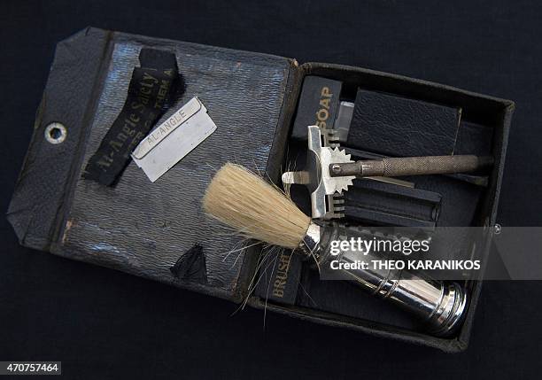 Australia-history-WWI-Gallipoli-graves,FEATURE by Madeleine Coorey This photo taken on April 17, 2015 shows an army issued shaving kit owned by...