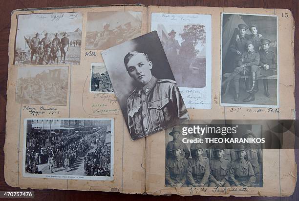 Australia-history-WWI-Gallipoli-graves,FEATURE by Madeleine Coorey This photo taken on April 17, 2015 shows a scrap book of old photos owned by...