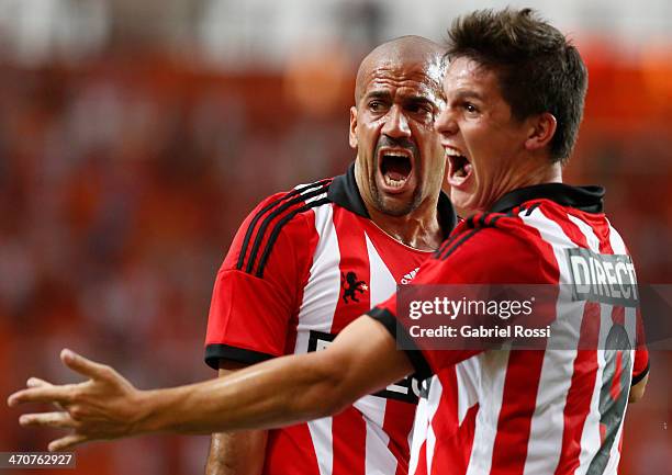 Guido Carrillo and Juan Sebastian Veron of Estudiantes celebrate the first goal of their team during a match between Estudiantes and Lanus as part of...