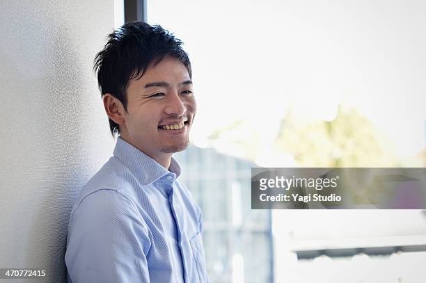 businessman working in office - japanischer abstammung stock-fotos und bilder