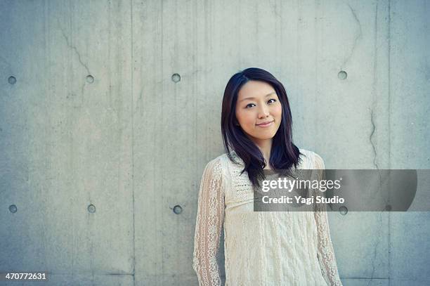 portrait of woman smiling,japan,tokyo - blouse bildbanksfoton och bilder