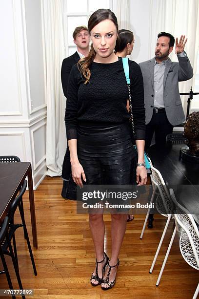 Actress Jessica McNamee attends the 2015 Art Of Elysium dinner with photographer John Russo on April 22, 2015 in Los Angeles, California.