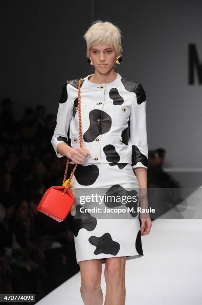 Sasha Luss walks the runway at the Moschino fashion show at Milan