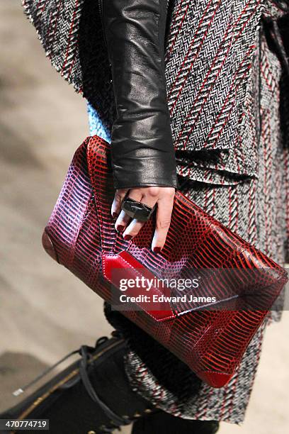 Model walks the runway at the Kenneth Cole Collection fashion show during Mercedes-Benz Fashion Week Fall 2014 at The Garage at Lincoln Center on...