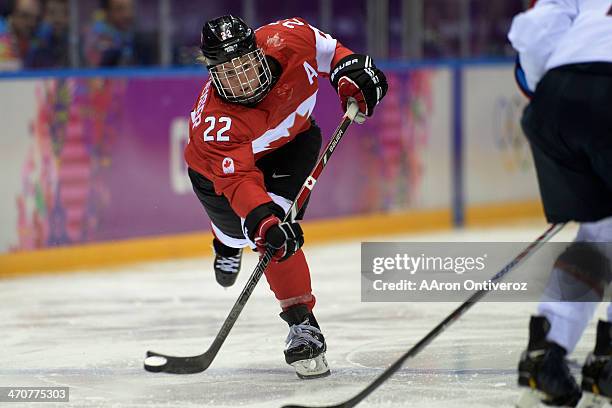 Hayley Wickenheiser of the Canada takes a shot against the U.S.A. During the second period of the women's gold medal ice hockey game. Sochi 2014...