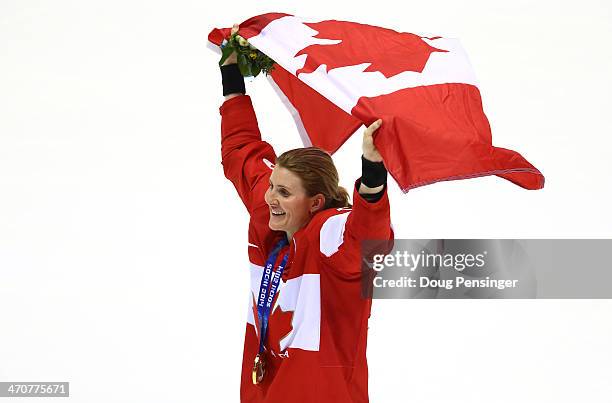 Gold medalist Hayley Wickenheiser of Canada celebrates after defeating the United States 3-2 in overtime during the Ice Hockey Women's Gold Medal...