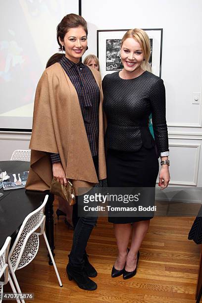 Actress Abbie Cornish and Jacquelyn Schiller attend the 2015 Art Of Elysium dinner with photographer John Russo on April 22, 2015 in Los Angeles,...