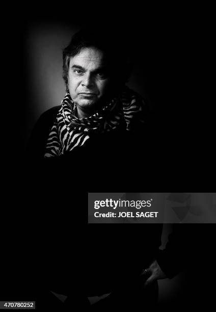 French writer Alexandre Jardin poses with a zebra scarf, the symbol of the movement he launched and which calls for a concrete commitment, open to...