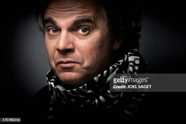 French writer Alexandre Jardin poses with a zebra scarf, the symbol of the movement he launched and which calls for a concrete commitment, open to...