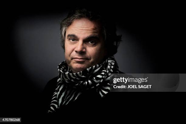 French writer Alexandre Jardin poses with a zebra scarf, the symbol of the movement he launched and which calls for a concrete commitment, open to...